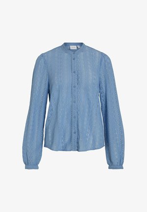 Camicia button-up azzurro chiaro in pizzo con maniche lunghe e scollatura tonda. Presenta motivi testurizzati e polsini con volant.