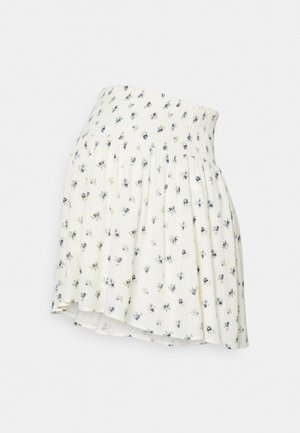 Korte rok met een bloemenpatroon in crèmekleurige stof, met een smock tailleband en plissé ontwerp, versierd met blauwe en groene bloemaccenten.