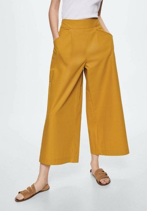 TRONA H - Tygbyxor - mustard