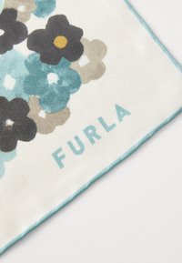 Silk scarf featuring a floral pattern in teal, black, and beige, with the brand name "Furla" printed in light blue along the edge.