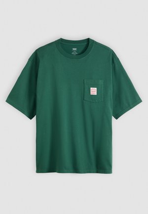 Green short-sleeve cotton T-shirt with crew neck and chest pocket featuring a small rectangular label with red text.