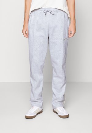 KIRBY WIDE PANTS UNISEX - Pantalon de survêtement - grey melange/cornsilk