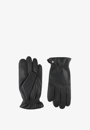 Schwarze Lederhandschuhe mit geschwungenem Design, elastischem Handgelenk für einen engen Sitz und glatter Textur. Ein Handschuh verfügt über ein Lederpaneel auf der Handfläche.