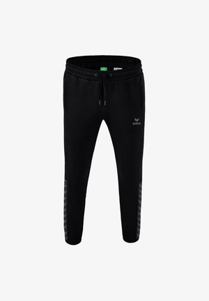 Erima, TEAM ESSENTIAL - Tracksuit bottoms - schwarz