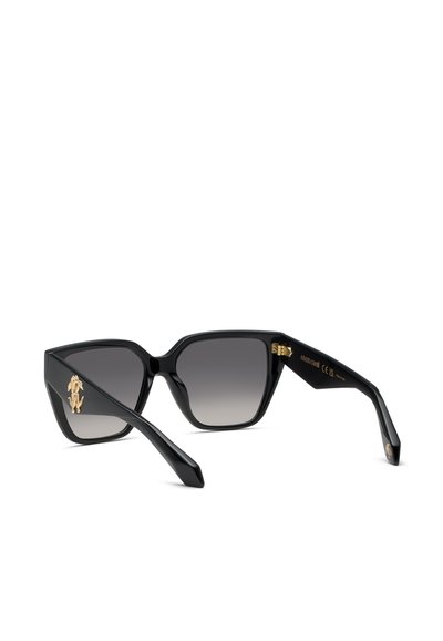 Lunettes de soleil noires œil de chat avec verres à dégradé foncé et petits ornements animaux dorés sur les branches.