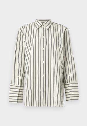 Camisa de colarinho, abotoada, em tom creme com riscas verticais pretas. Apresenta mangas longas com punhos listrados contrastantes e um tecido texturizado.
