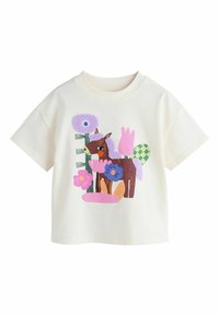 Krátký rukáv krémové tričko s barevným motivem koně a květinami z texturovaných aplikací v růžové, modré a zelené barvě.