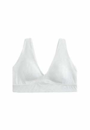 Fehér, varrás nélküli, puha anyagú melltartó széles vállpántokkal és mély V-nyakkivágással, kényelmet és könnyű tartást biztosítva.