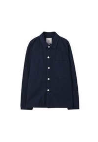 Tummansininen puuvillapaita, jossa on nappi etuosa, terävä kaulus, pitkät hihat, yksi rintatasku ja valkoiset napit. Ominaisuutena on rento istuvuus.