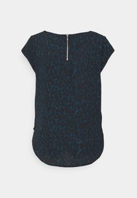 Haut bleu foncé à manches courtes avec un motif léopard, un col rond et une fermeture éclair métallique au dos.