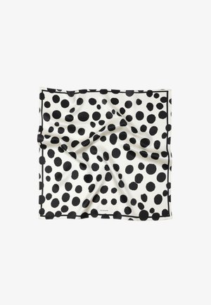 Siidist sall, millel on valge taust suurte mustade täppidega ja kitsas must äär. Kanga pind näeb välja sile ja veidi kortsus.