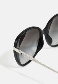 Michael Kors FLATIRON - Päikeseprillid - black