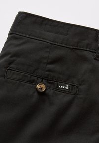 Levi's® PLEATED TROUSER - Shorts - caviar