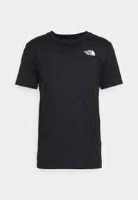 Camiseta de algodón negra con mangas cortas y cuello redondo. Presenta un logotipo blanco en el área del pecho izquierdo. Textura suave, ajuste estándar.