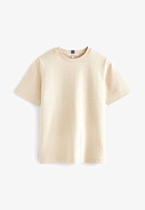 Beige kortærmet t-shirt med rund hals, lavet af blødt materiale med en diskret tekstur og en afslappet pasform. Ingen synlige logoer.