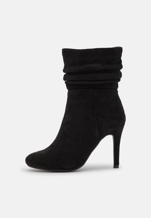 Stivaletti con tacco - black