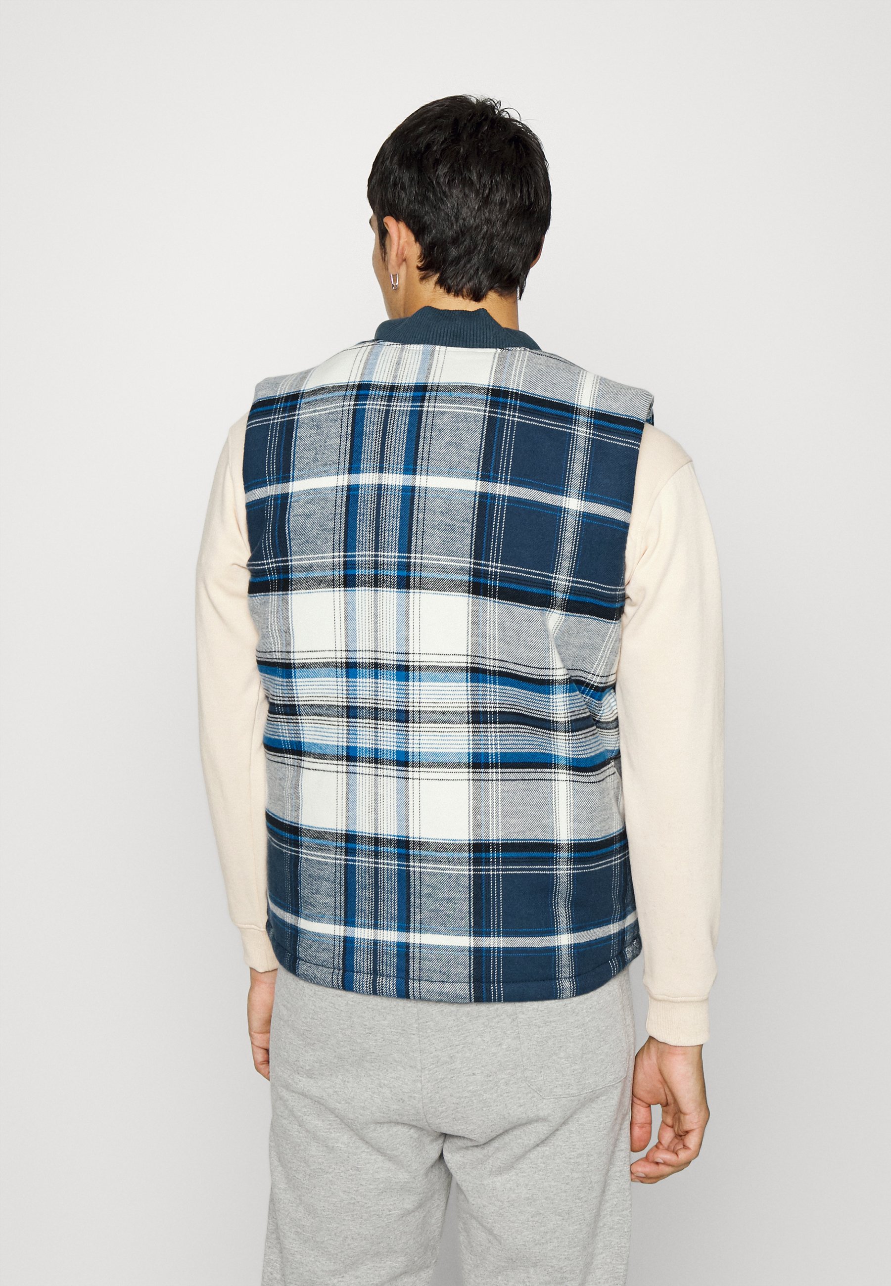 checked vest