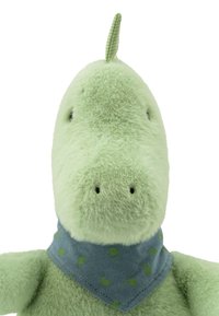 Plush dinosaur toy in light green, featuring a soft texture, rounded shape, and a blue bandana with green paw print pattern.