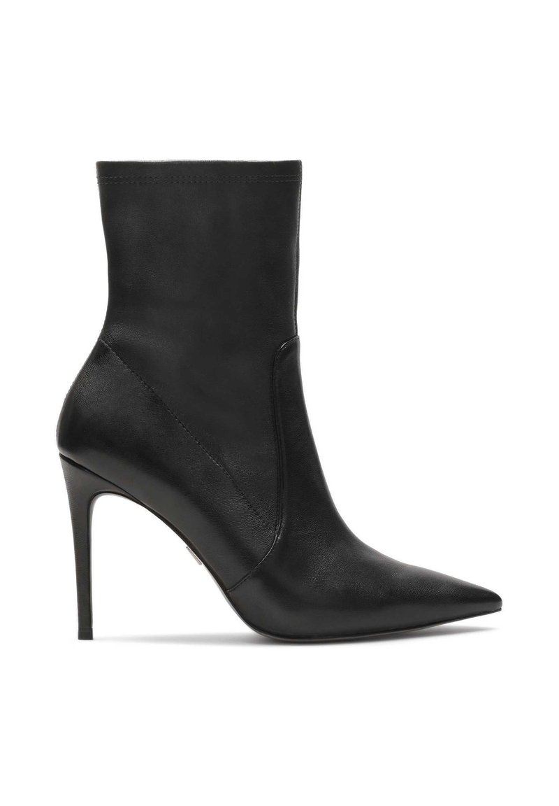 Black leather ankle boot with a pointed toe, slim high heel, and minimalistic design. Smooth texture with subtle stitching detail.
