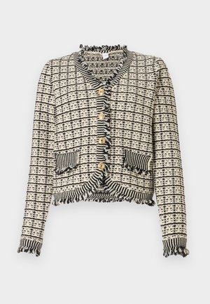 Cardigan țesut alb și negru cu un model houndstooth, margini desfăcute, nasturi aurii și două buzunare frontale. Design scurt și fitted.