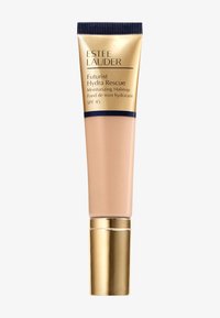 Estee Lauder Futurist Hydra Rescue-tube med et mykt beige produkt, gull- og marineblå aksenter, lett tekstur og SPF 45-merke.