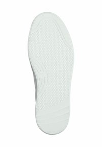 White rubber shoe sole with textured honeycomb pattern and curved lines. Smooth finish with no visible branding or markings.