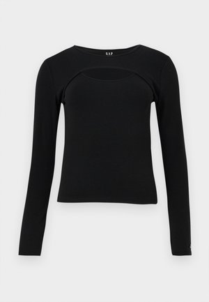 Μαύρο εφαρμοστό τοπ με μακριά μανίκια, στρογγυλή λαιμόκοψη και κυρτή λεπτομέρεια κοψίματος στο πάνω μέρος του στήθους, ετικέτα GAP μέσα στον γιακά.