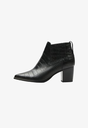 Black ankle boot with a pointed toe, made from textured leather with a crocodile pattern, featuring a block heel and elastic side panels.