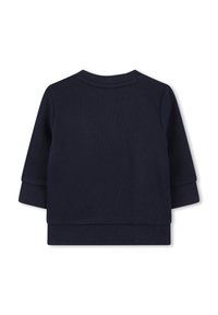 Navy blue cotton sweatshirt featuring long sleeves, ribbed texture, and a round neckline with a straight hem. Simple and layered design.