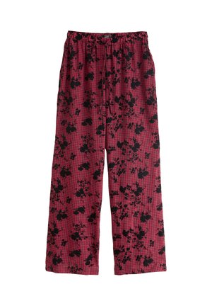 Pantaloni a quadri rossi con motivo floreale nero, dotati di vita elastica e design a gamba larga, realizzati in tessuto leggero.