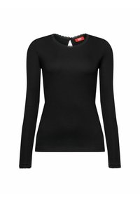 Haut noir ajusté à manches longues avec bordure en dentelle au col et aux poignets, présentant une petite ouverture en forme de goutte et une fermeture par bouton dans le dos au niveau du col.