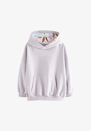 Ljubičasti pulover s kapuljačom od mekanog materijala s velikim džepom. Ima podstavu s cvjetnim uzorkom u kapuljači i logotip na prednjem dijelu.