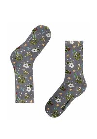 Calzini grigi con un motivo festivo che include vischio, agrifoglio, bastoncini di zucchero e stelle, su uno sfondo innevato.