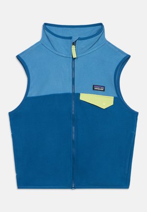 Hõlmikuta Patagonia fliisvest kahes sinises toonis, ees lukk ja väike kollane snap-tasku rinnal.