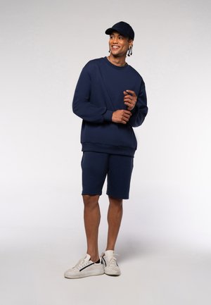 EOSELIO UNISEX  RELAXED FIT - Tracksuit bottoms - navy