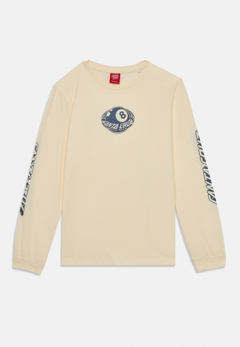 Hosszú ujjú tejszínszínű pamut póló, a mellrészen kék grafikai ábrázolással egy nyolcas labdáról, és a "Santa Cruz" felirattal az ujjak mentén.