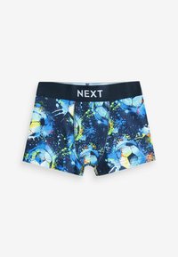 Boxers pour garçons avec une ceinture noire portant la mention "NEXT" et un motif coloré de ballon de football et d’éclaboussures de peinture sur fond bleu foncé.