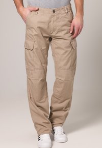 Urban Classics CAMOUFLAGE CARGO PANTS - Hlačami s stranskimi žepi - beige