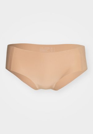 Nude seamless brief with a smooth texture, low-rise design, and wide sides for comfort. Features minimal branding on the interior.