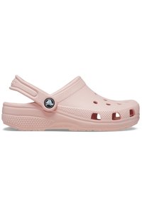 Zueco de goma de color rosa claro con agujeros de ventilación, correa trasera, lado texturizado y logotipo circular. Diseño suave con forma ergonómica para mayor comodidad.