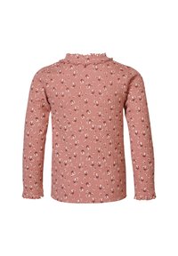 Dłuższa bluzka z długim rękawem, wykonana z różowego materiału w prążki, z kwiatowym wzorem oraz falbanami przy dekolcie i mankietach. Miękka w dotyku, dopasowana sylwetka.