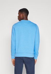 Tommy Hilfiger LOGO - Sportinis megztinis - blue spell
