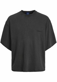 Svart oversized t-shirt tillverkad av bomull, med rund halsringning, korta ärmar och en subtil brodering av "ORIGINALS" på framsidan.