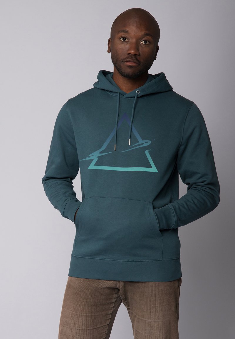 Türkisfarbenes Baumwoll-Hoodie mit einer Vorderseite in Kängurutasche, Kapuze mit Kordelzug und einem geometrischen grafischen Design in Lila und Blau auf der Brust.