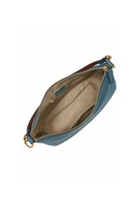 Petit sac à bracelet en cuir bleu avec fermeture éclair dorée ouverte, intérieur en tissu beige et petite poche intérieure visible.