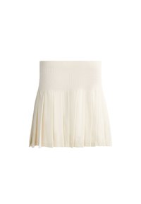 Mini-jupe plissée ivoire avec une large ceinture élastique côtelée, réalisée en tissu léger.