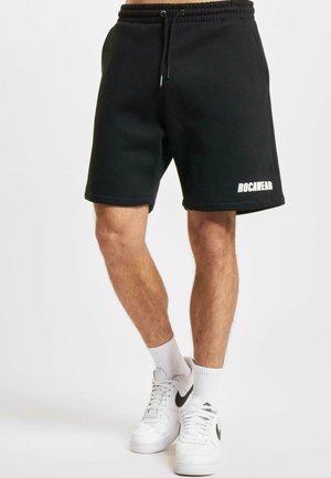 CLEAN - Tracksuit bottoms - black