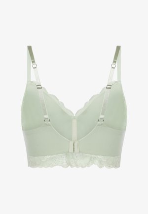 Reggiseno in pizzo verde chiaro con spalline regolabili, chiusura posteriore a ganci e occhielli e bordo inferiore in pizzo smerlato.
