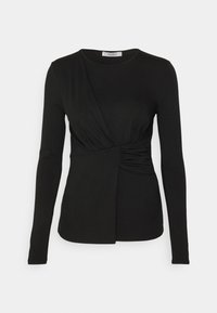 Czarny top z długim rękawem z krojem typu wrap, zebranym detalem po boku i gładką teksturą. Okrągły dekolt z dopasowanym sylwetką.