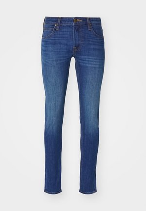 Jeans slim-fit in denim blu scuro, con design a cinque tasche, vita standard con chiusura a bottone e lieve scolorimento sulle cosce.